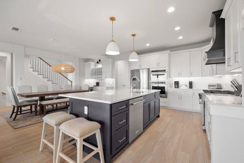 Fully Equipped Kitchen with Breakfast Bar + Double Ovens - Third Floor