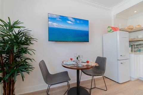 Table 30" round and leather chairs from West Elm.  Start your day with a lovely breakfast.  