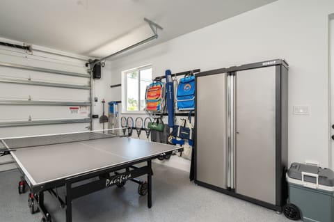 Beach chairs, racquets, games, and cooler for use