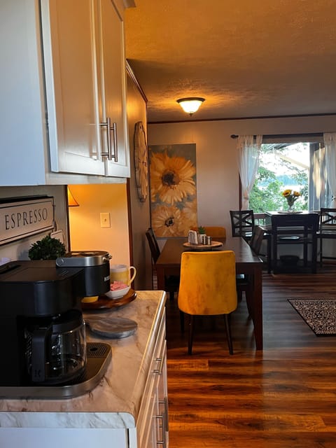 Spacious eat in kitchen with plenty of seating and views of the lake.  
