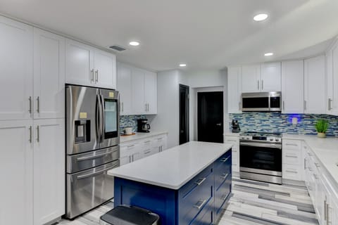 YouTube music on the smart refrigerator while cooking for the family. Enough pots, pans, and cooking utensils for a Thanks Giving Dinner!