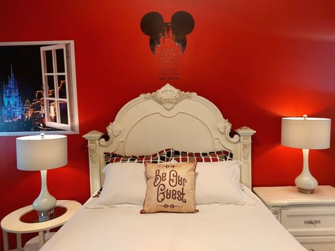 Disney Room (Queen Bed) door access to the patio