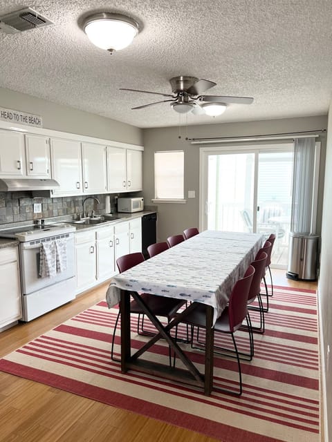 Full sized kitchen with table for eight. 