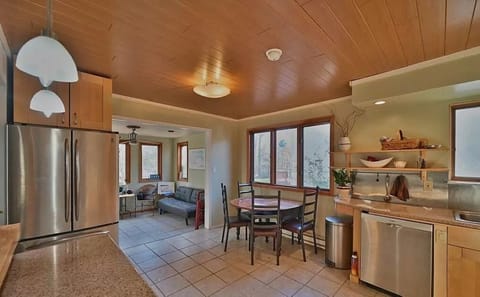 A view of the fully stocked kitchen and sitting area