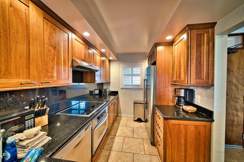 Granite countertop in full kitchen, equipped with dishwasher too!