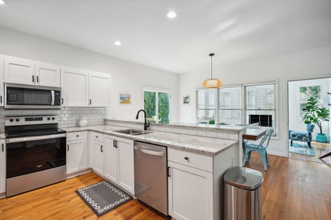 Open concept kitchen and dining space.
