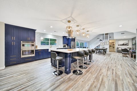 Home is open and so expansive it provides noise seperation living & game rooms