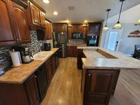 Full service kitchen with convection oven, drop in range, dishwasher, icemaker