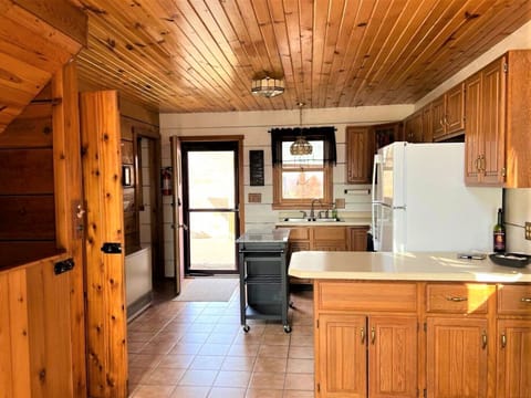 Wood half door on stairway leading downstairs