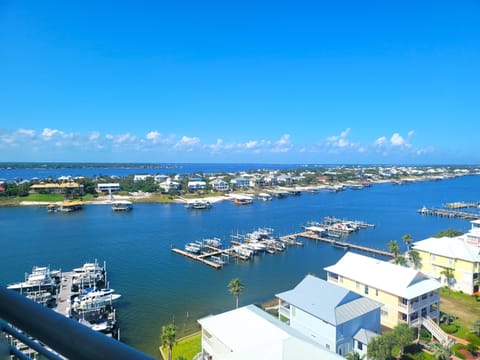 A stunning balcony view offering a glimpse of the serene waterfront and Ono island. A perfect spot to relax and enjoy the scenery.
