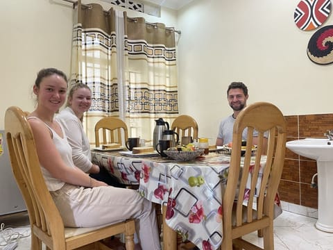 Group of guests enjoying morning full breakfast