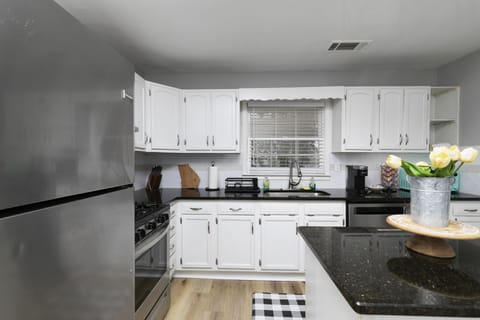 A wide array of appliances and kitchen supplies, K Cup coffee included. 