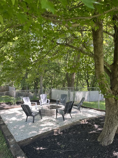 Large fire pit and backyard seating area