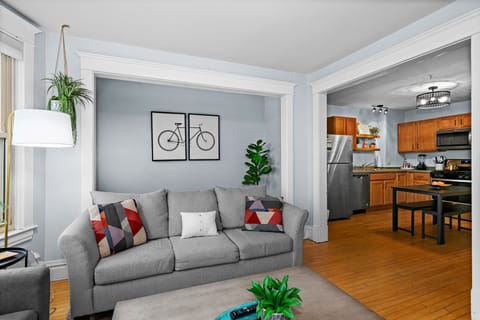 Bright and inviting space with stylish decor and seamless kitchen connection!