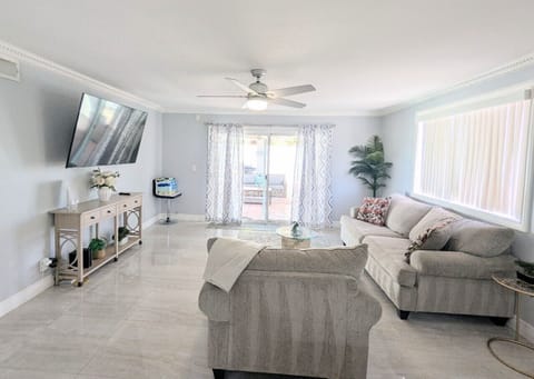 Luxurious second living room with access to the backyard