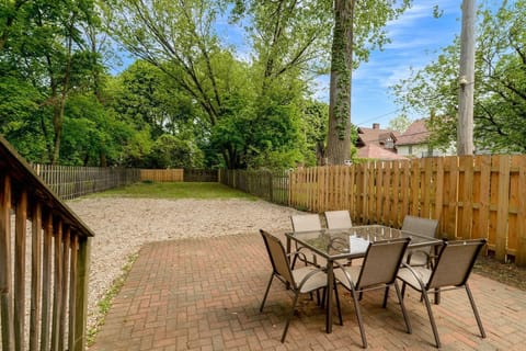Step out onto the brick patio, where comfort meets charm. With a stylish table, comfy chairs, and a BBQ grill ready to go, it's the perfect spot for morning coffee, sunset dinners, or sizzling up something special under the open sky.