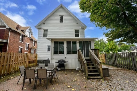 The rear view of our weekend home is just as inviting—featuring a spacious yard, charming patio, and peaceful surroundings. It’s the perfect backdrop for morning coffee, evening BBQs, or simply soaking in the calm between adventures.