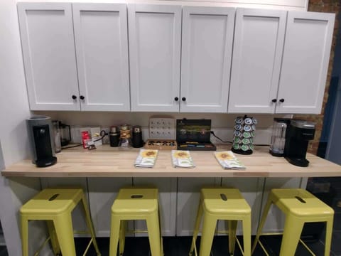 Kickstart your mornings or wind down your evenings at our cozy coffee & tea bar—stocked with all the essentials for your perfect cup. Whether you're a latte lover or tea time fan, it’s a warm little corner made for comfort and weekend vibes.