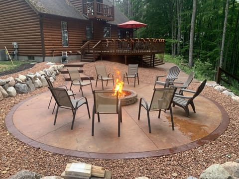 Outdoor firepit patio overlooking the Betsie River 