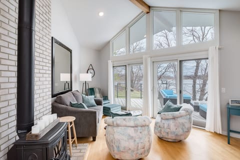 
Main level living room, amazing views of the lake with patio doors to the deck