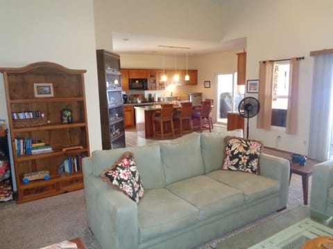 An open floor plan allows easy access to the fully equipped kitchen