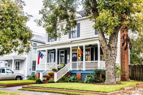 Front of house from the street. Driveway is to the left when facing the house.