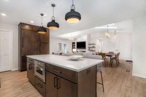 Prepare Meals Without Being Left Out w/ This Open Floor Concept.