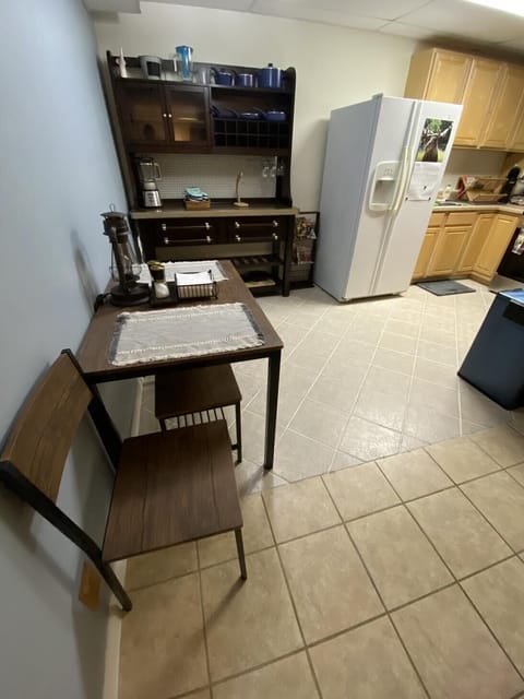 Dining area complete with pots, pans & baking rack. 