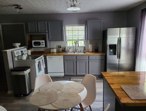 Full kitchen stocked with everything you need for meal preparation.