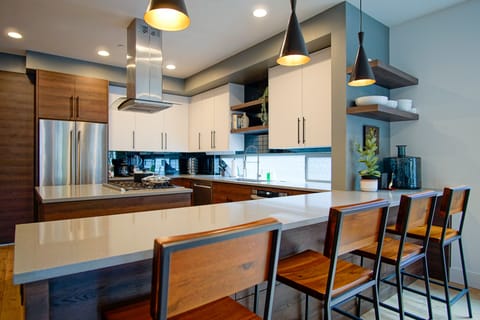 Chef's kitchen is generously sized and fully outfitted with everything you need.