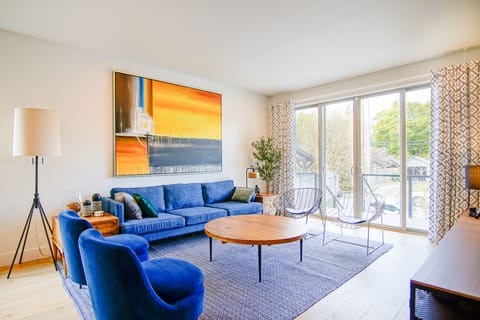 Architect designed interior has comfort, style, high ceilings and huge windows. 