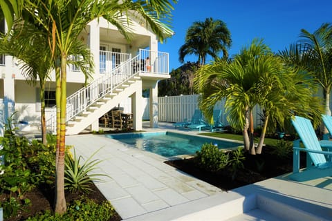 Custom chilled and heated pool overlooking 30' dock
