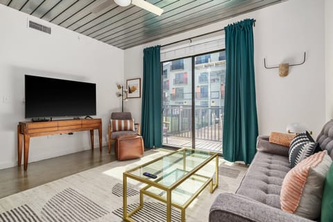 Kick back and relax in this cozy living area with a smart TV.