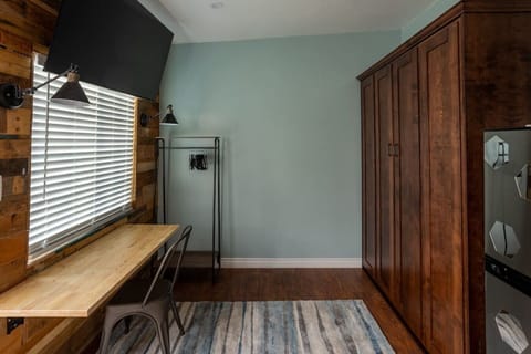 Murphy bed up w/ folding work desk.