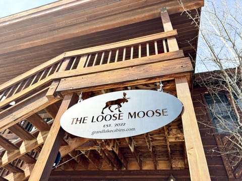 Welcome to The Loose Moose – Look for our handcrafted oval metal sign out front, a true rustic touch that marks the start of your mountain cabin escape.