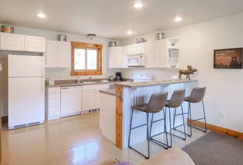 Enjoy a full kitchen in our cozy mountain cabin! Complete with oven, microwave, coffee maker, and all the essentials for your family vacation or group stay at The Loose Moose.