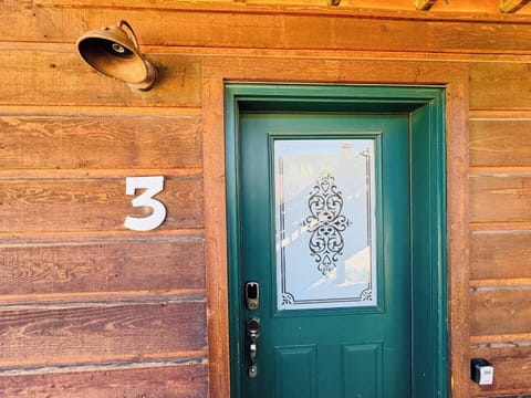 Step into a cozy retreat at The Loose Moose Lodge, with a charming exterior that reflects its natural surroundings. Nestled in Grand Lake, this condo offers the ideal location for mountain adventures.