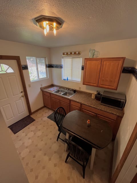 We like to keep just a couple of chairs in the kitchen when we are not eating