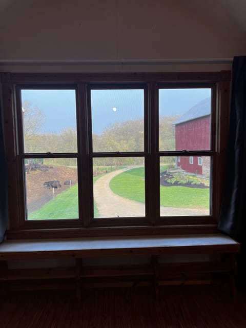 Picture window overlooks the farm.