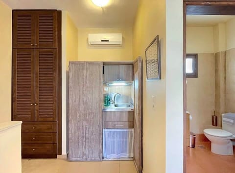 Kitchenette with Essentials – Compact and practical for everyday use.