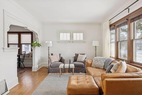 Living room on the main level, features 65" SMART TV