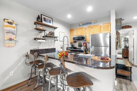 Enjoy casual dining and conversations at the kitchen counter.