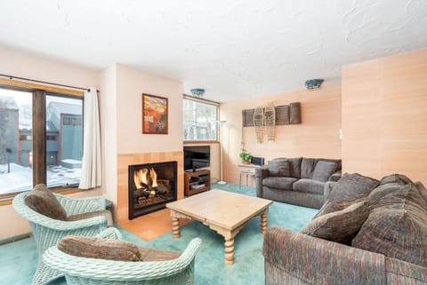 Cosy living area with a fireplace to keep you warm.