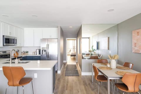 The apartment features a fresh and airy, open concept design