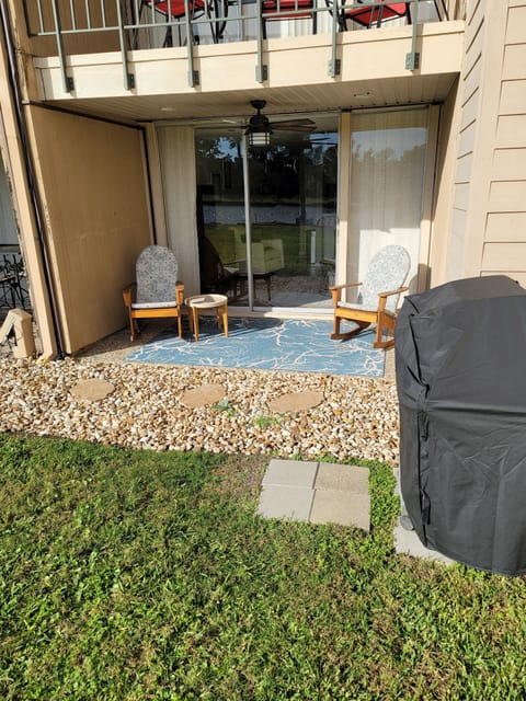 Outside looking in to your patio with ceiling fan. 