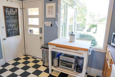 The checkerboard kitchen has everything you need: all appliances, dishes, pots/pans, utensils and all.