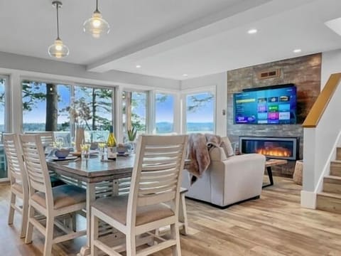 The open concept great room features expansive water and mountain views!