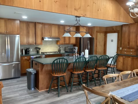 UPSTAIRS MAIN LIVING AREA LIVING ROOM KITCHEN DINING TABLE