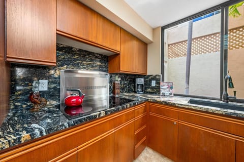 Full kitchen with granite countertops and modern appliances