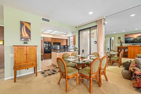 Dining area with glass top table and seating for six